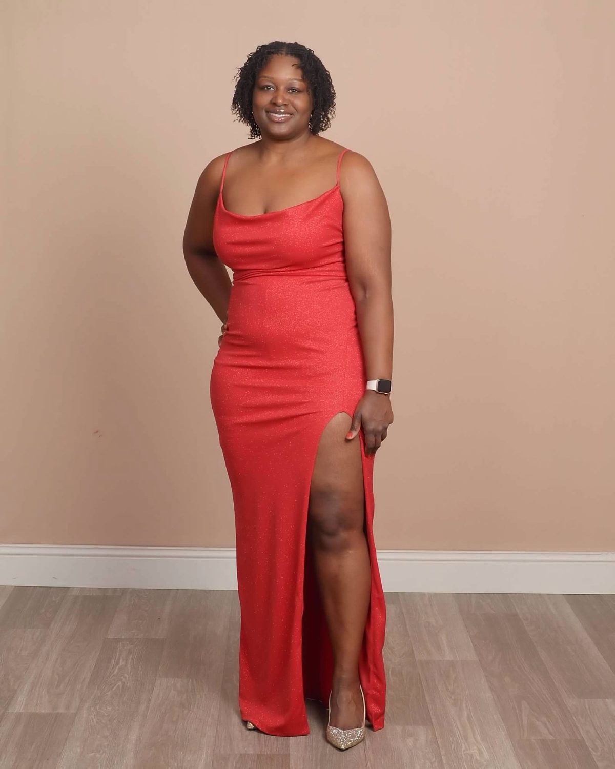 Rovna-Lyn T. Joseph standing in a red gown